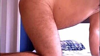 A young gay man is disciplined through spanking