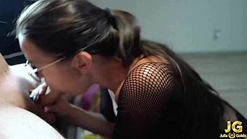 the sexy brunette girlfriend sucks and jerks off his cock after work