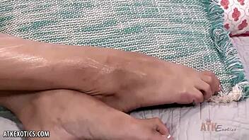 Sexy black haired Lola Pearl rubs her clit on the sofa, horny fingering.