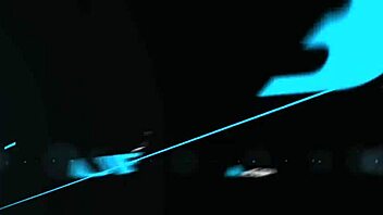 Charley Chase in red and black fishnets masturbating.