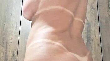 Milf plays with dildo in pussy?