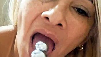 Milf plays with dildo in pussy?