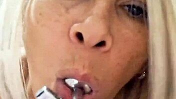 Milf plays with dildo in pussy?