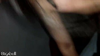 Amateur woman gives a blowjob to a black man at night