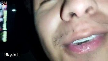 An amateur sucks a black guy's big cock at night