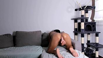 Young Latina beauty enjoys homemade doggystyle dildo play