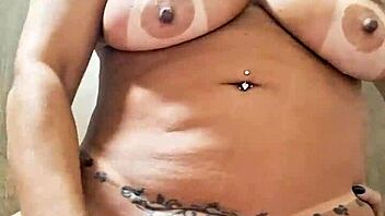 Milf plays with dildo in pussy?