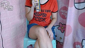 Why is this Asian girl painting her naked body with lipstick?