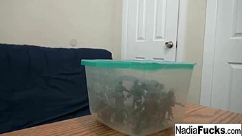 Sexy blonde pornstar Nadia eats cereal with soldiers, showing big tits and ass in military theme 😍