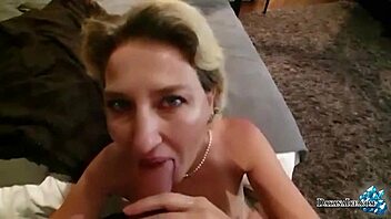 slutty blonde fists her ass and pussy while sucking monster cock