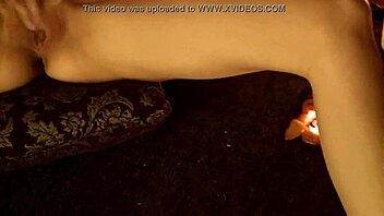 in cosplay ritual with candles she masturbates outdoors