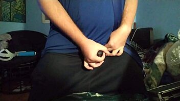 I masturbate with my chastity cage in this gay scene