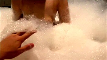 Perverted couple gets wild with steamy action in bubble bath