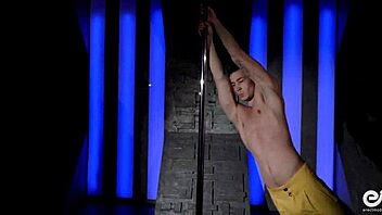 i watch this sexy gay guy striptease on the pole, he's so hot and acrobatic