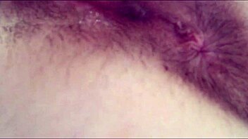 Hairy pussy dripping wet from excitement as she toys herself to orgasm