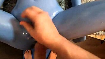 Intimate encounter with a full-sized, blue-skinned sex doll