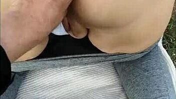 Masturbating in the field with exposed pussy?