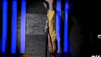 i watch this sexy gay guy striptease on the pole, he's so hot and acrobatic