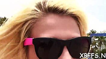 A teen babe shares attention with a lad