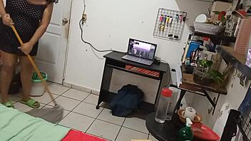 Hidden camera captures mature housewife in domestic duties