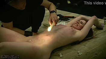 ISABELLA BOTH GETS WAX ON HER NIPPLES THEN SWALLOWS A LOAD OF CUM