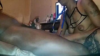 Ebony beauty licks and sucks cock in suggestive blowjob scene