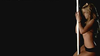 Shakira shows off her pole dancing skills in a bikini