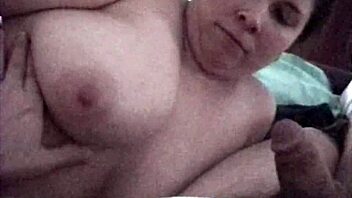 Busty Brunette Performs Oral