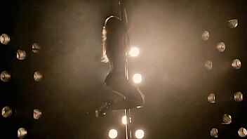 Shakira shows off her pole dancing skills in a bikini