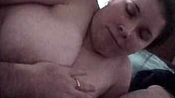 A voluptuous brunette engages in a playful oral sex act until ejaculation inside her mouth