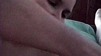 Busty Brunette Performs Oral