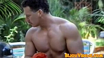 Vintage bodybuilders engage in raw group sex with hung studs