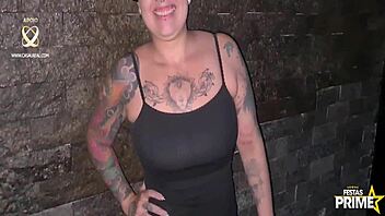 Feeling the passion, tattooed beauty Barbara Lioness connects with well-endowed DJ Jump at Festaprime.