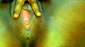 Teen shows off cameltoe while masturbating in a steamy solo session.