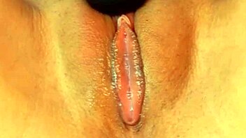 Teen shows off cameltoe while masturbating in a steamy solo session.