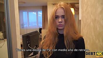 The gorgeous redhead, Rose Wild, from Debt4k purchases a massive 4K TV but struggles to afford it