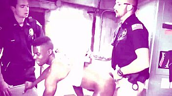 Two gay cops suck and ride big black cock outdoors.