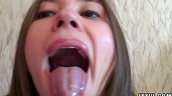 Kinky tongue action on a purple dildo
