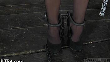 Restrained Gal Endures Harsh Punishment in Garage, Witness Her Struggle and Torment!