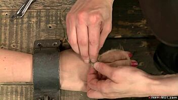 Redhead lesbian BDSM sex with toy and bondage
