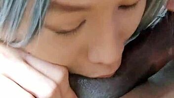 Tiny Asian shemale gets stuffed with big black cock