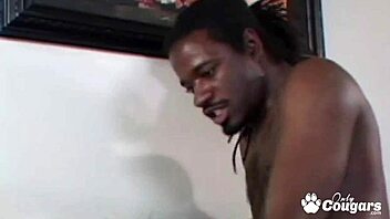 Ebony goddess passionately services a huge black shaft
