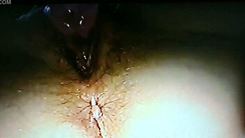 In this homemade scene, the blindfolded wife is fucked with a rabbit toy