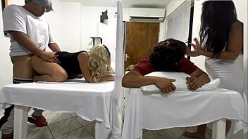 A sensual massage session leads to an unexpected threesome with a wild doctor in a hospital setting