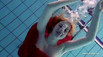 Russian teen Lucie enjoys swimming in the bathtub