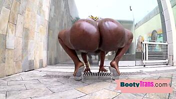 Tgirl with big ebony ass twerks poolside then gives a kinky blowjob