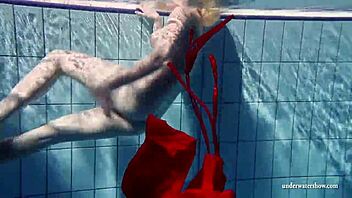 Russian teen Lucie enjoys swimming in the bathtub
