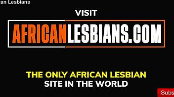 ebony women engage in playful strap-on activities and enjoy eating fruit.