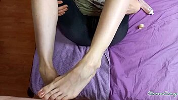 wife jerking my cock with legs, peed on them and cum