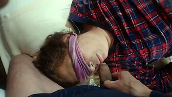 He forcefully passes his monster cock through my wife's mouth and over her face while resting, delivering a massive cumshot